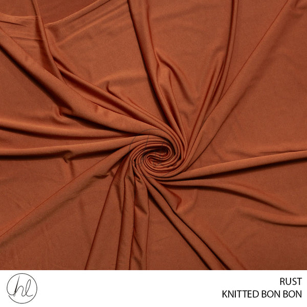 Knitted bon bon (55) rust (150cm) per m